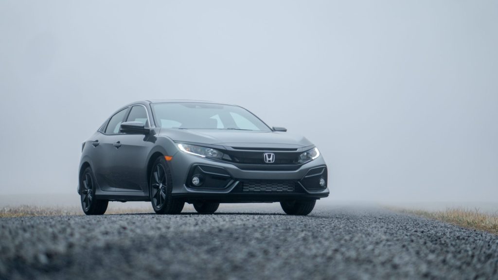 car on foggy road